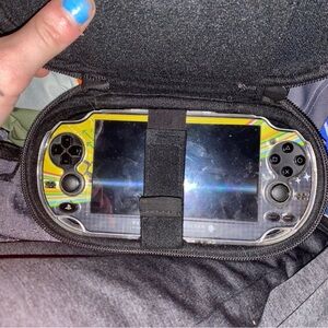 Sony PlayStation Vita Handheld Gaming Console with Yellow Accents